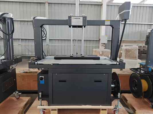 Qualidade  Semi-Automatic 1200mm Carton Box Strapping Machine with One Year Warranty for Efficient Packing Fábrica